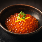 Yuzu-aged salmon roe ikura in dark ceramic bowl with yuzu peel garnish, fine dining omakase presentation