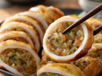 Macro close-up of squid sundae slice showing squid exterior and savory filling with vegetables