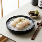 Hotate scallops served on ice with soy sauce and wasabi