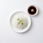 Ika Slice cuttlefish noodles top-down with cucumber and sesame